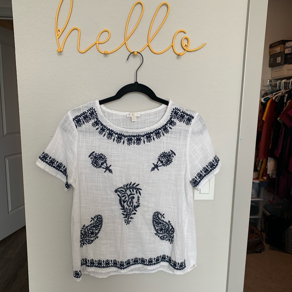 White shirt with blue pattern